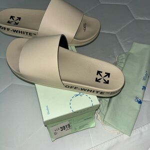 men off white slides size 10 1/2 with box and dust bag In good condition,